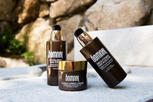 Korean skincare product bottles on a stone surface