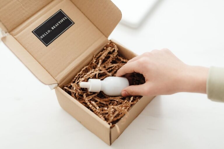 Hand opening a beauty product package for a return
