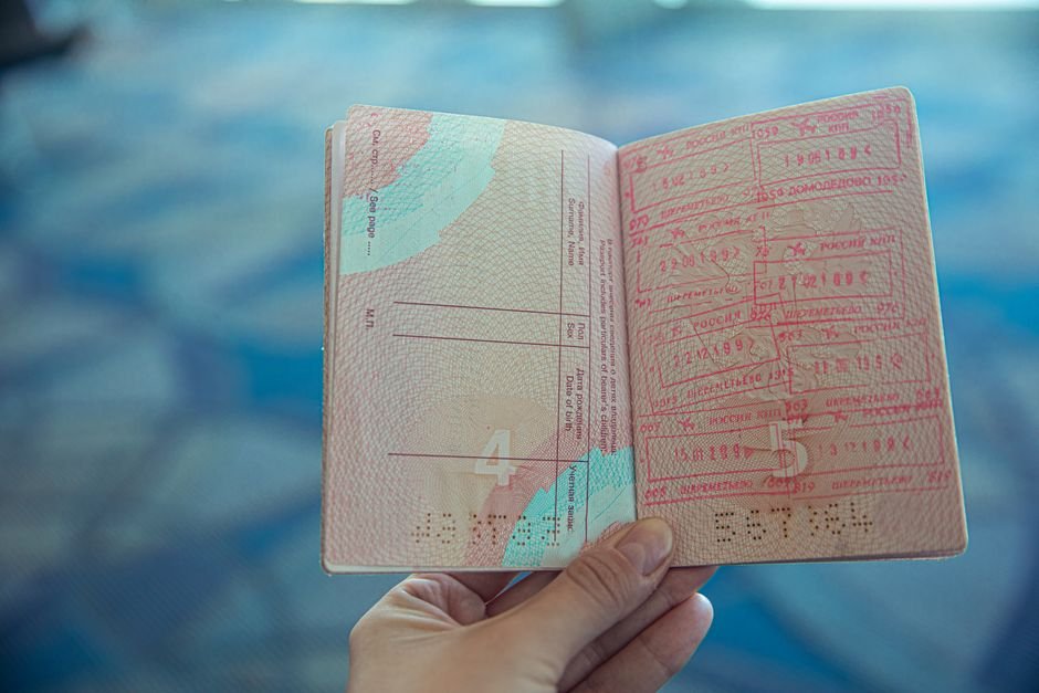 Passport with entry stamps representing Indonesia visa paperwork for digital nomads