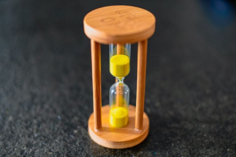 Hourglass representing the reinstated ChatGPT Plus five-hour usage cap