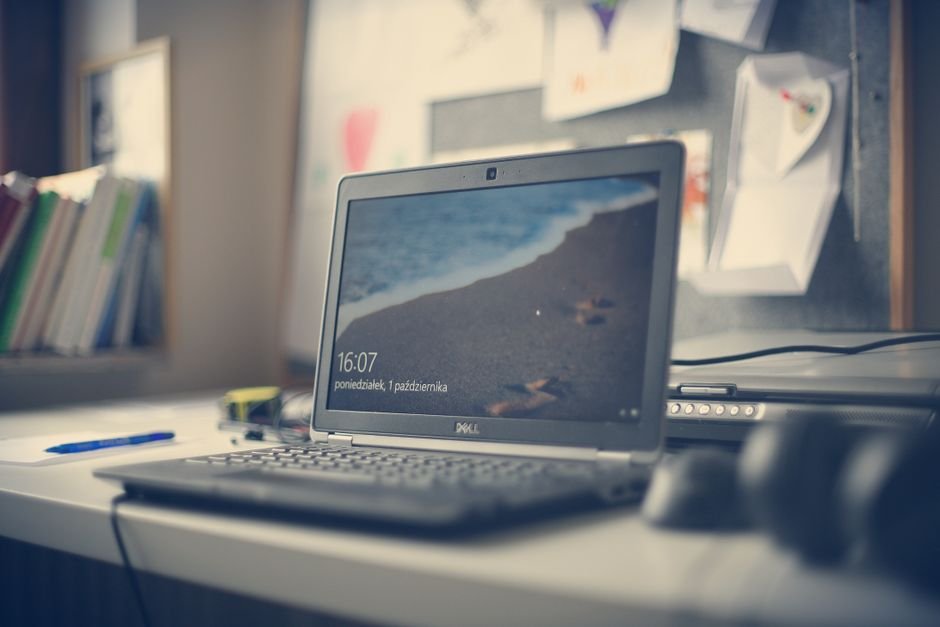 Laptop showing the Windows 11 taskbar after Copilot went missing from it