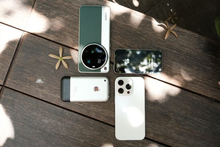 Assorted smartphones on a table representing the Pixel 11 upgrade decision