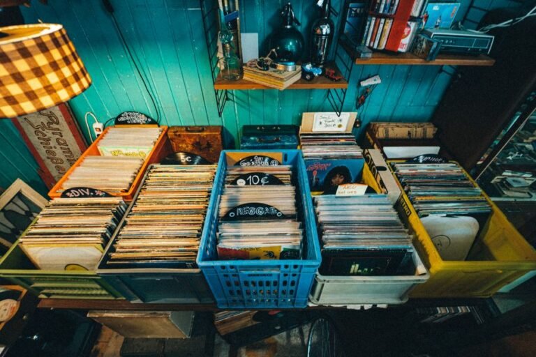 Wooden crates full of vinyl records at a thrift store, ready for sorting