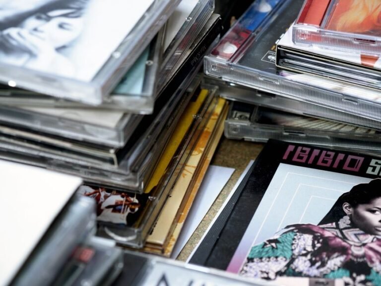 Stack of CD albums representing TWICE fourth Japanese best album #BEST 2015-2025