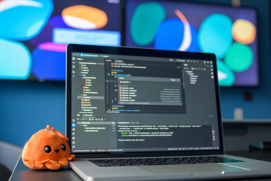 Laptop screen showing lines of code, representing an AI coding and agent workflow