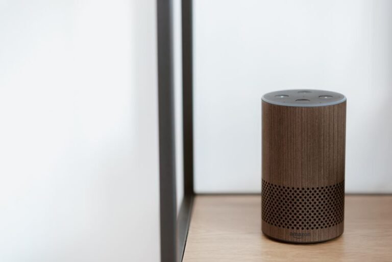 Smart speaker on a shelf representing Google Home devices affected by the Gemini broadcast bug