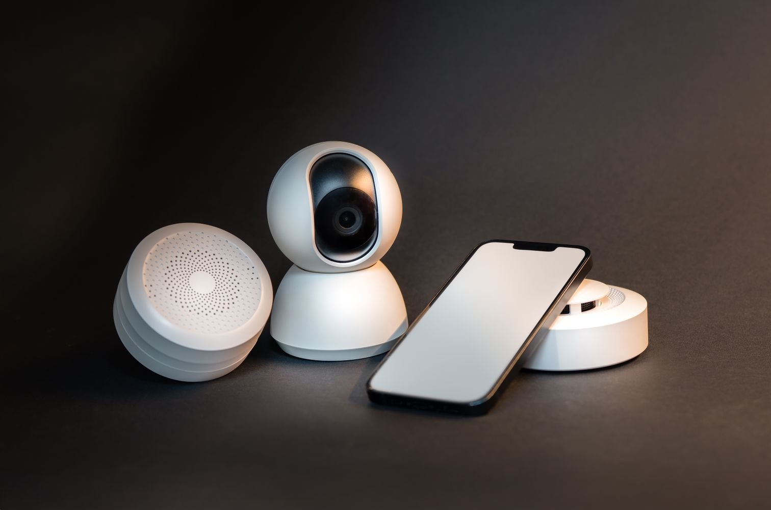 Smart home device being set up in a living room next to a robot vacuum dock