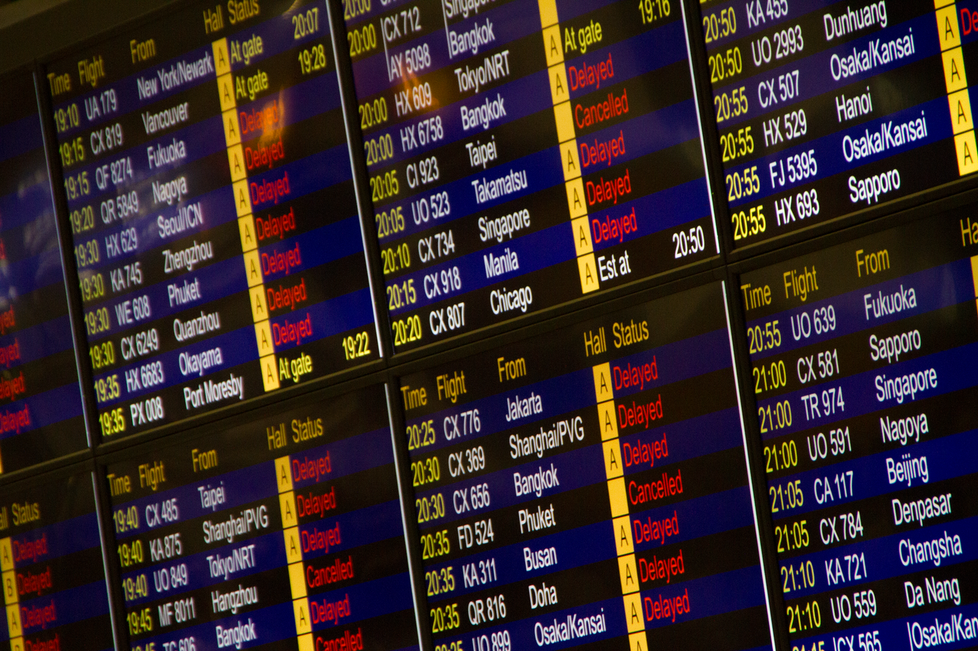 Digital airport flight information board showing departures
