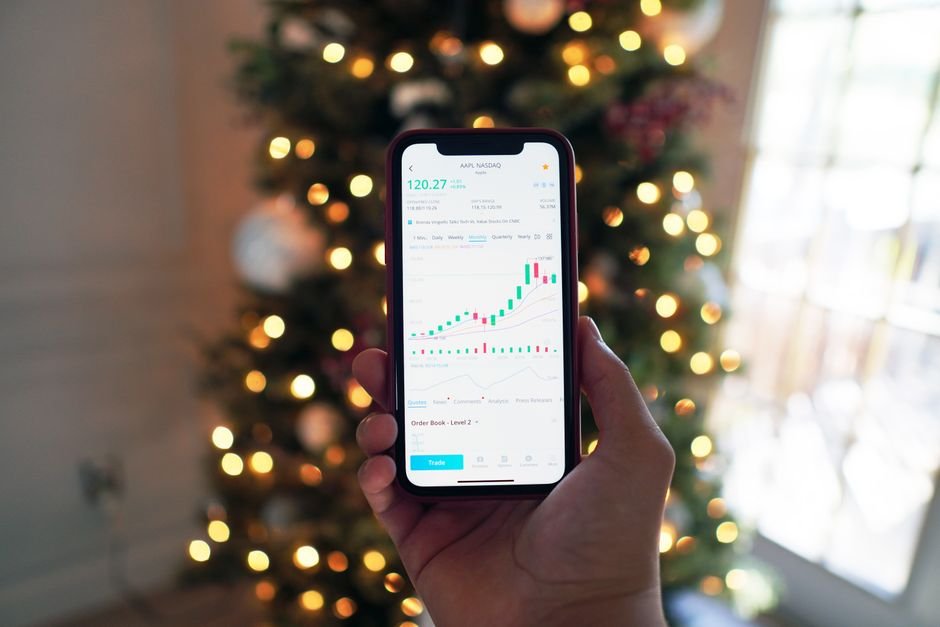 Phone showing an investing app for buying US stocks with USDC