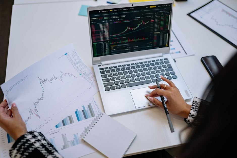 Laptop displaying charts and graphs, the kind of visual answer ChatGPT Intelligent UI can generate