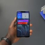 Smartphone showing app notifications, illustrating Claude Duet access and alerts