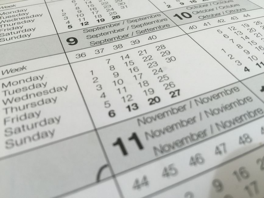 Monthly calendar pages used to plan when a purchase lands
