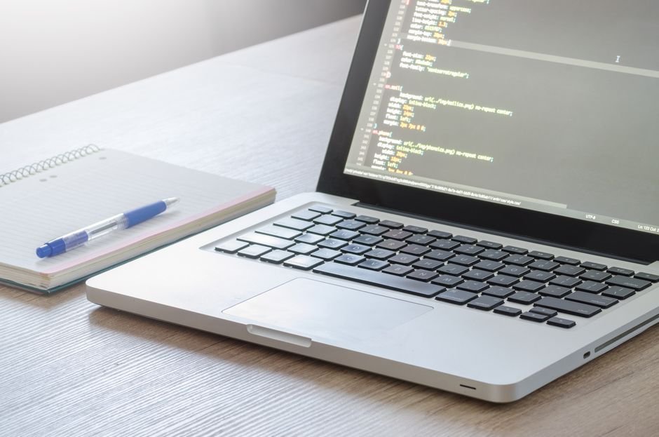 Laptop with a code editor open, representing Cursor usage under The X Subscription