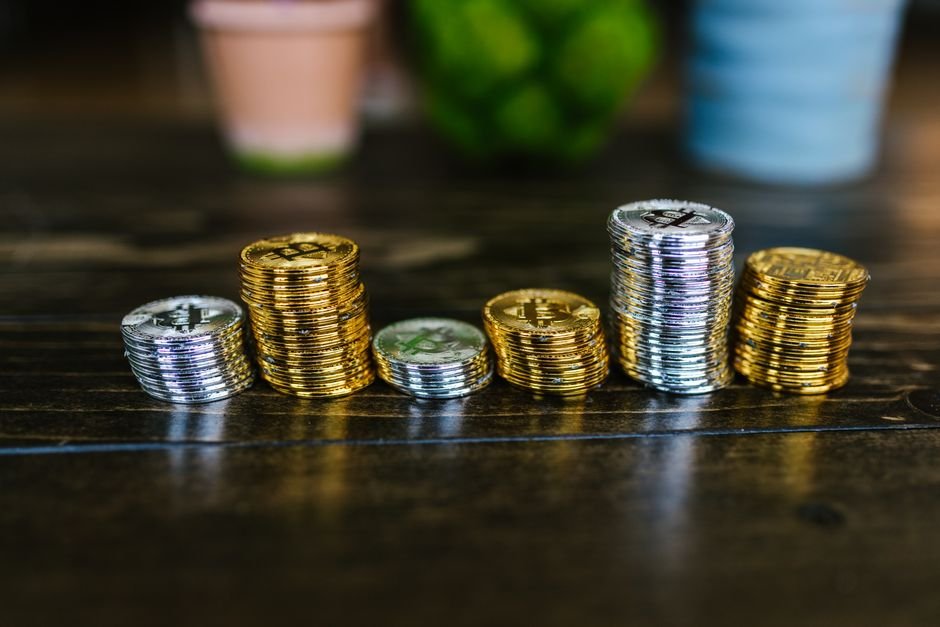 Stack of coins representing stablecoin holdings being moved before a deadline