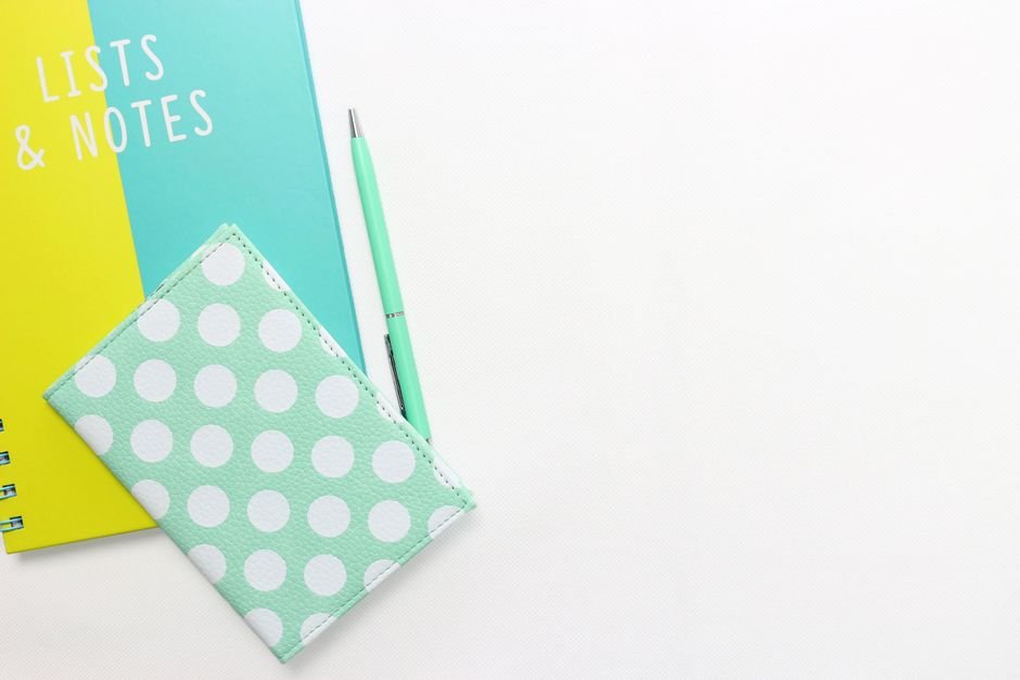 Notebook and pen for logging practice trades