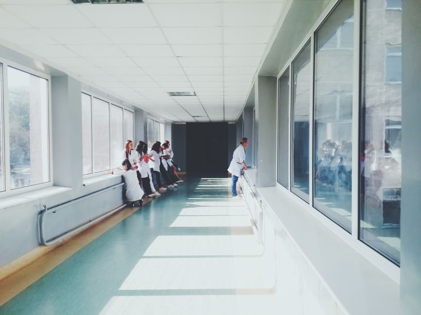 Hospital hallway with medical staff, the kind of care SafetyWing and Genki nomad insurance cover abroad
