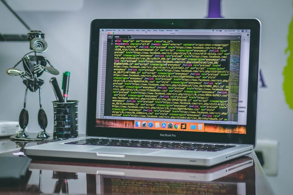 MacBook showing code, where a pasted install command should be checked before pressing Return