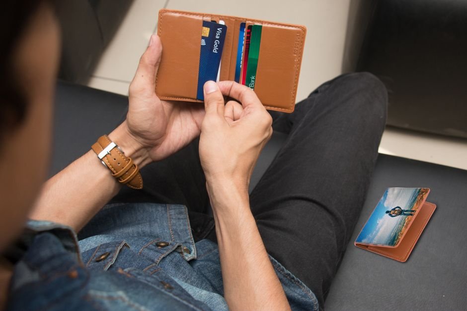 Wallet with credit cards, checking which card a Costco membership auto-renews on