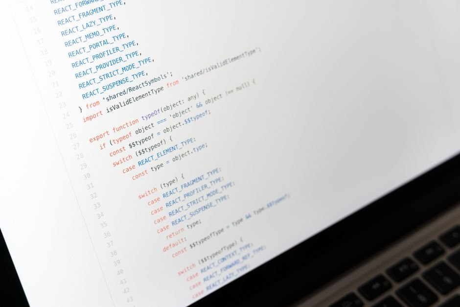 Code on a laptop screen, illustrating an OKX WebSocket URL change