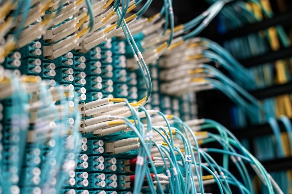Network cables in a server rack representing a domain network